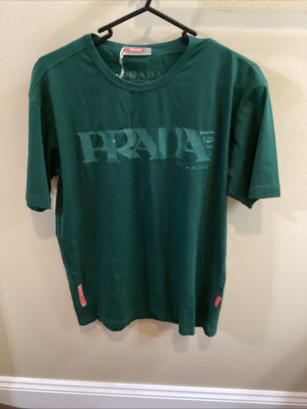 New Prada Green Logo Crewneck T-Shirt has a flaw